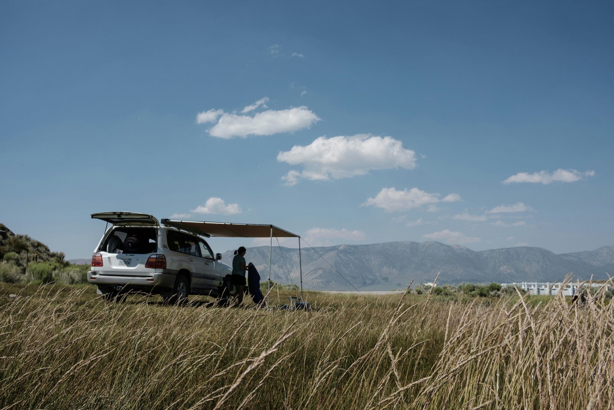 Cleverly designed camper van with Murphy bed, office, and Tesla power system